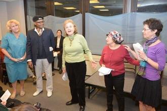 Barbara Haspal (center) surrounded by (from left) Suzanne Engel, Basil Joseph, C