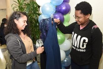 Katelyn Maldonado (left), a teacher at IS 217 in the Bronx, is impressed by her 