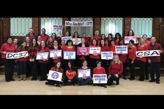 Staff members at PS 88 in Ridgewood, Queens, wore red to show love for their uni
