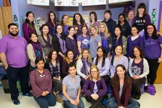 The staff at PS 244 in Flushing — including Chapter Leader Meaghan Reilly (back 