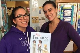 Teachers at PS 200 in Brooklyn wear purple for paid parental leave.