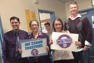 Teachers at MS 158 in Queens stand together for paid parental leave.