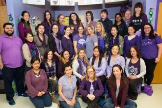 PS 244 in Queens wears purple for paid parental leave.