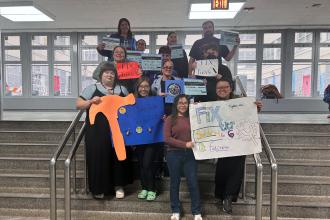 Members at PS 1 in Sunset Park, Brooklyn take a photo during the UFT's Fix Tier 6 Day of Action. 