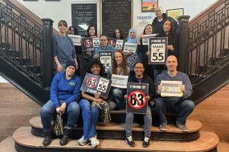 Members at PS 63 in the Bronx take a photo during the UFT's Fix Tier 6 Day of Action. 