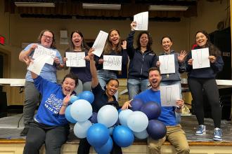 Members at PS 187 in Manhattan take a photo during the UFT's Fix Tier 6 Day of Action. 