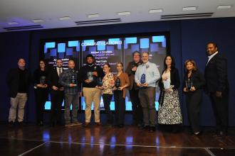 Manhattan award-winning CTE teachers gather on the stage at Shanker Hall at union headquarters during the UFT CTE Awards on Feb. 12, 2026. 