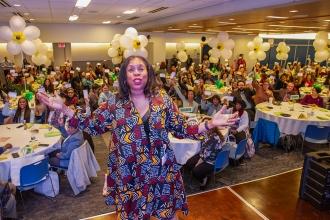 UFT Vice President for Elementary Schools Karen Alford in front of attendees at the UFT's 2024 Early Childhood Conference. 