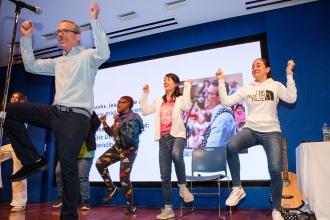 Eric Litwin leads attendees on stage as they dance to his “Polka Dot Pants” song during his “Joyful and Engaging Early Reading” workshop at the UFT's 2024 Early Childhood Conference. 