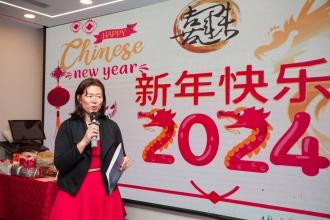 UFT treasurer Victoria Lee addresses guests at the 2024 UFT Lunar New Year celebration.