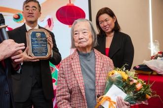Marian C. Thom (center) is honored for her service at the 2024 UFT Lunar New Year celebration.