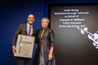 Manhattan Borough Advocate Curtis Young presents Chapter Leader Tammie Miller with a proclamation at the 2024 Provider Appreciation Awards Ceremony at UFT Headquarters on May 10, 2024. 
