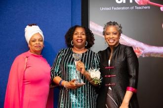 Melissa Reed, Karen Alford and Tammie Miller address the crowd at the 2024 Provider Appreciation Awards Ceremony at UFT Headquarters on May 10, 2024. 