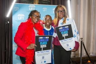A  teacher poses for a photo with her nephew and colleague 