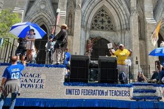 The UFT float passes by St. Patrick’s Cathedral on Fifth Avenue.