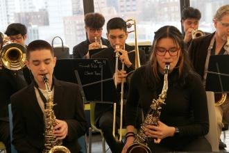 Student musicians play their instruments