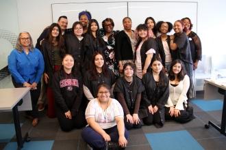 A large group poses for a photo