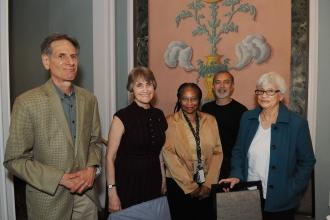 A group of retirees at the 2024 Retired Teachers Chapter Luncheon pose for a group photo