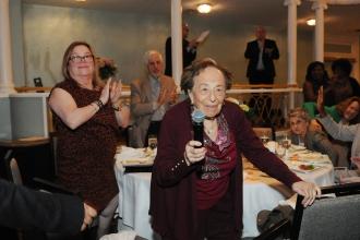 A retiree speaks at the 2024 UFT Retired Teachers Luncheon.
