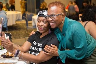 Two women take a selfie together 