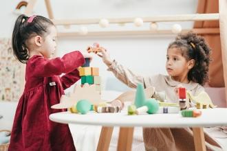 Young kids playing in classroom
