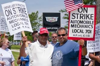 Men holding strike signs