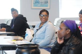 Kia Ferguson, a parent of a student in the AIMS program at P231, a District 75 program in Brooklyn, participates in a workshop at the UFT Brooklyn Parent Conference on Oct. 25, 2025. 