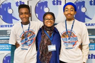 Women stands between her sons