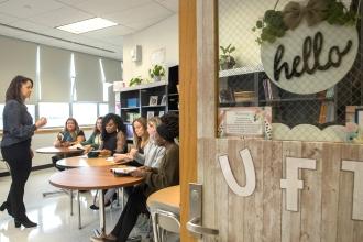 Teacher Center coach Samantha Hall at PS/IS 295 in Jamaica, Queens, conducts a professional learning session.