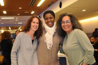 Three school social workers take a group photo during the 2026 UFT Clinicians Appreciation Day event.