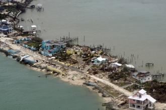 Beach and houses under water after Hurricane Dorian