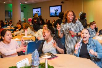 Alford joins members during group karaoke in a nod to the conference’s “learning through play” theme.