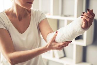 UFT member with cast on arm injured in the line of duty