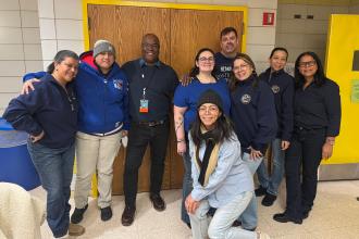 Members at PS 8 in Manhattan show out in their union blues in support of fixing Tier 6
