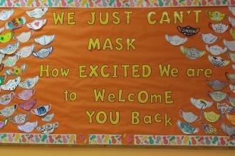 A sign welcoming back students