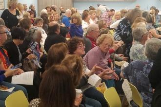 The refurbished Florida Retiree Center in Boca Raton was packed on March 7 to hear from Jill Biden (inset), the wife of Democratic presidential candidate Joe Biden.