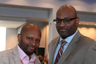 Former UFT Vice President for Career and Technical Education Sterling Roberson (right) received the Retiree of the Year Award during the May 1–2 convening of the Representative Assembly of NYSUT, the UFT’s state affiliate. 