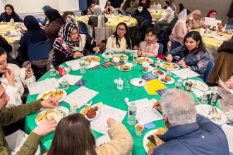 Members and guests play a Ramadan-themed bingo during the UFT Muslim Heritage Committee's annual Iftar celebration on Feb. 27, 2026. 