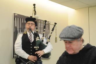 Richard Niccolich, an elementary school gym teacher at PS 174 in Queens, plays his signature bagpipes as part of the festivities.