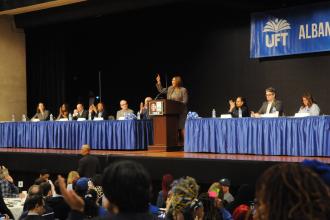 New York State Attorney General Letitia James receives loud applause when she voices strong support for reducing the retirement age for Tier 6 members from 63 to 55 with 30 years of service.