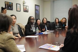 UFT Teacher Center members meet with a staffer for state Sen. Shelley Mayer (foreground, right) in the Legislative Office Building.