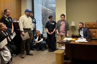 Members from Districts 1 and 2 in Manhattan meet with state Assembly Member Keith Powers in the Legislative Office Building.