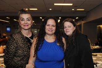 An award winner and her colleagues take a photo during the inaugural UFT Middle School Awards on May 15, 2025. 