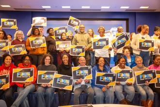 Middle school educators take time to show they are fired up to “Fix Tier 6” of the state pension system.