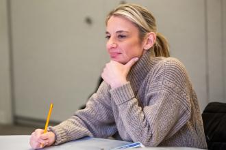 A woman looks on intently during a workshop at the 2026 UFT Middle School Conference on Feb. 7, 2026. 