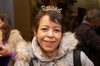 Cindy Navarro, who retired in July from the District 20 Pre-K Center at 21 Bay 11th Street in Brooklyn, wears the tiara she received at her school retirement party to the luncheon.