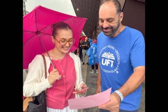 Alexandra Collin, a new teacher at PS 274 in the Bronx, gets help enrolling as a UFT member