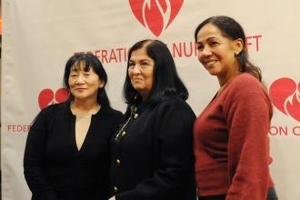 Goldman stands with nurses Bimala Sherpa (left) and Milagros Oliva, both of NYU Langone Hospital–Brooklyn, where nine unfairly fired nurses won their jobs back with full back pay, in one of the UFT’s biggest arbitration victories.