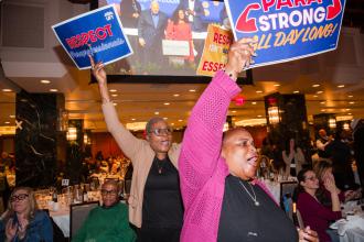 UFT paraprofessionals join a cheer during the 2026 UFT Paraprofessional Awards Luncheon on March 7, 2026. 