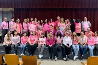 Teachers pose for Pink Day